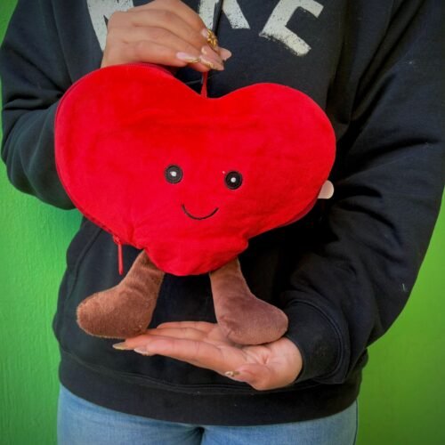 Peluche de corazon a una rosa